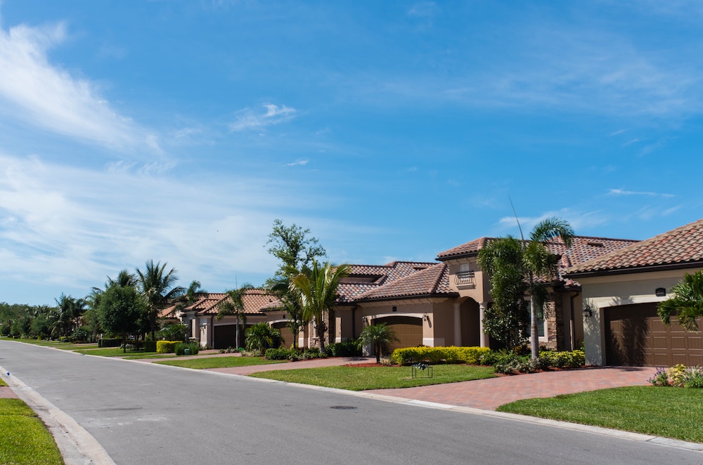 stucco homes with trees