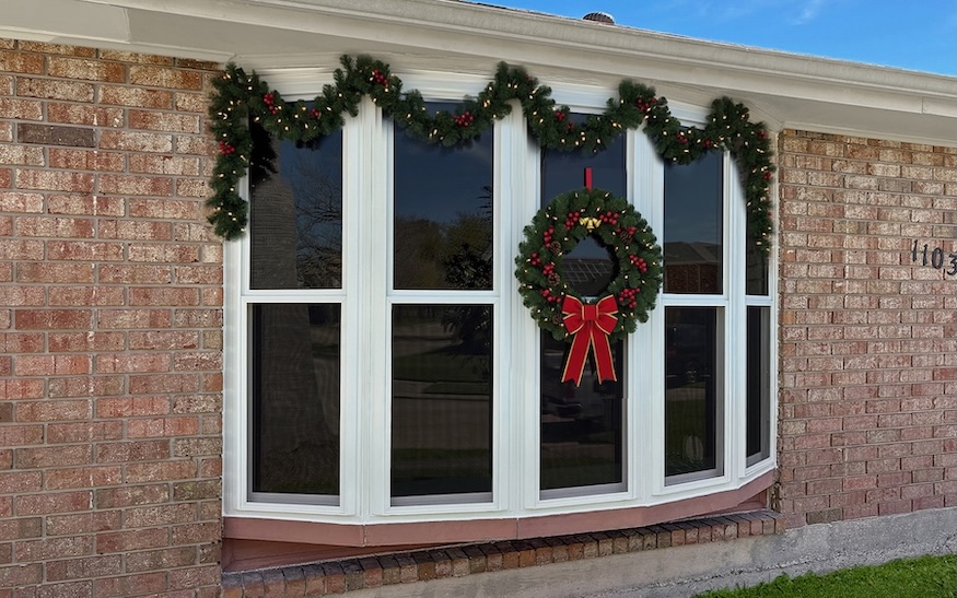 bow window decorated for the holidays